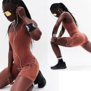 NWOT Free People FP Movement Never Better Runsie Size Small in Nutmeg